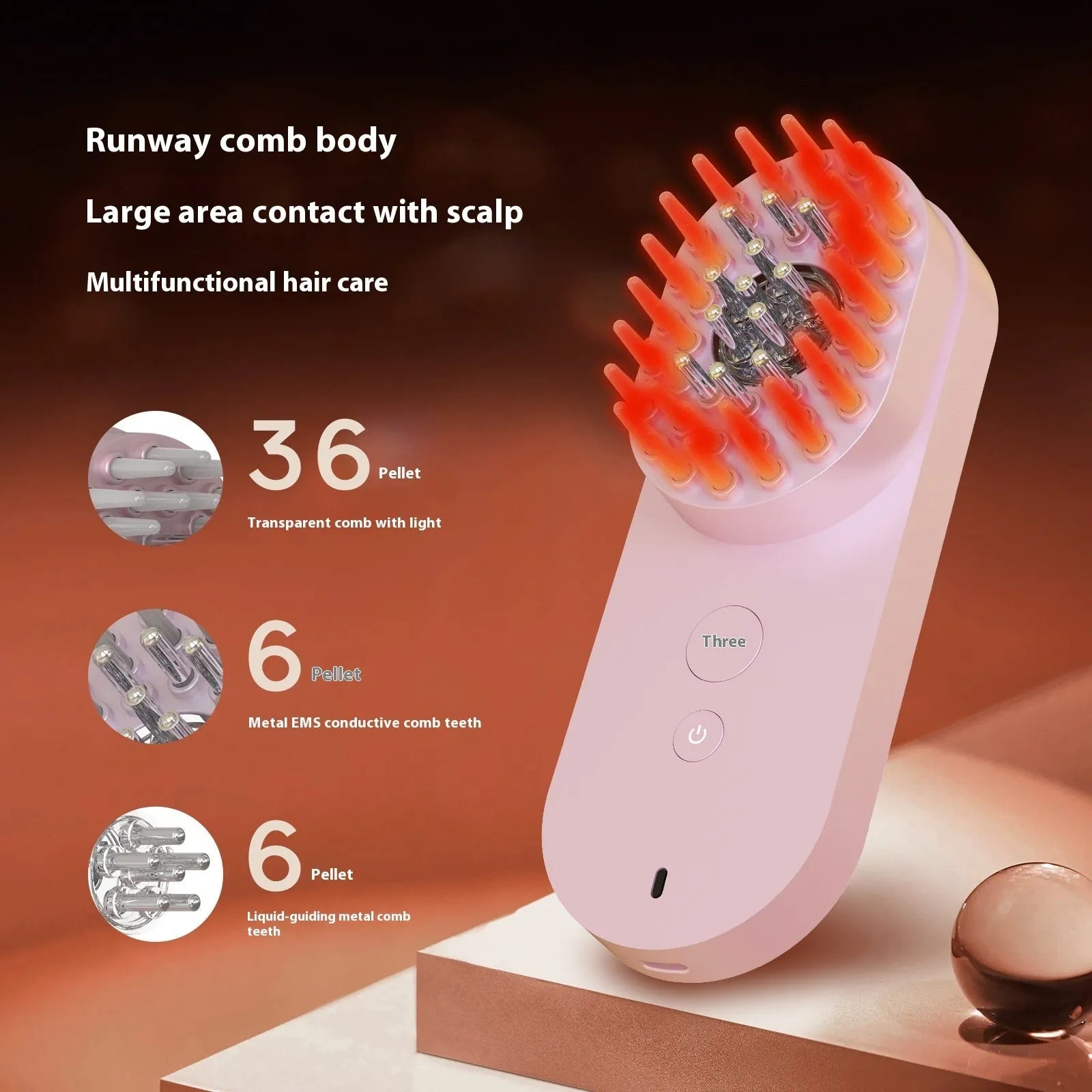 Compact pink smart massage comb with red light therapy for hair care
