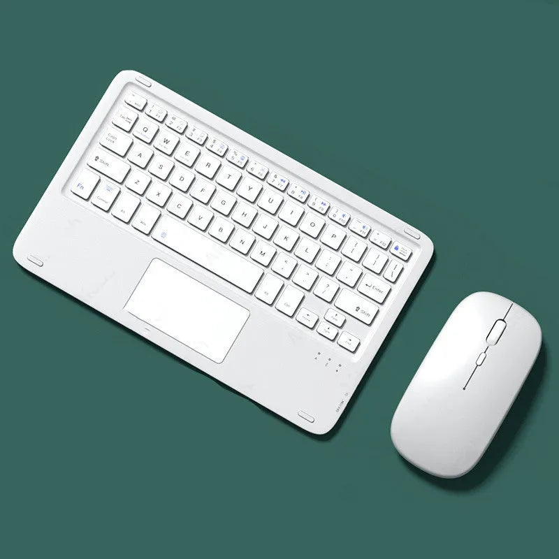 Pink wireless Bluetooth keyboard and matching dual-mode charging mouse on a desk