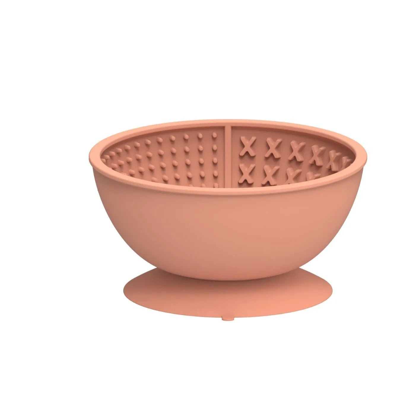 Cyan silicone dog bowl with slow feeder ridges and suction cup base on a table.