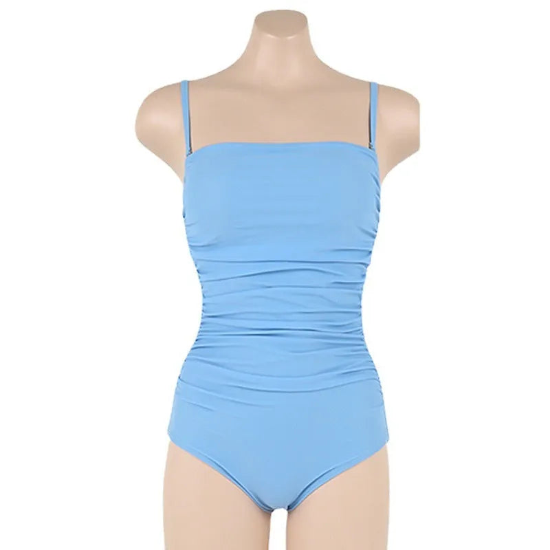 Blue sling style one-piece swimsuit with belly pleats on a mannequin.