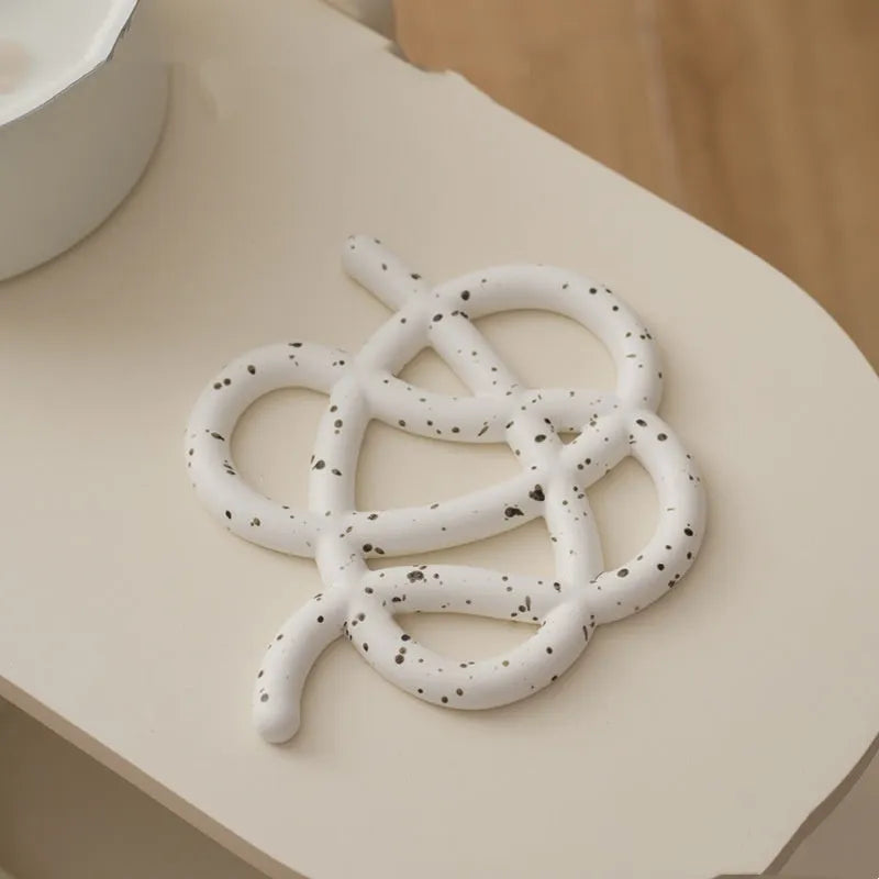 Ceramic heat proof mat with irregular shape design in solid colour options