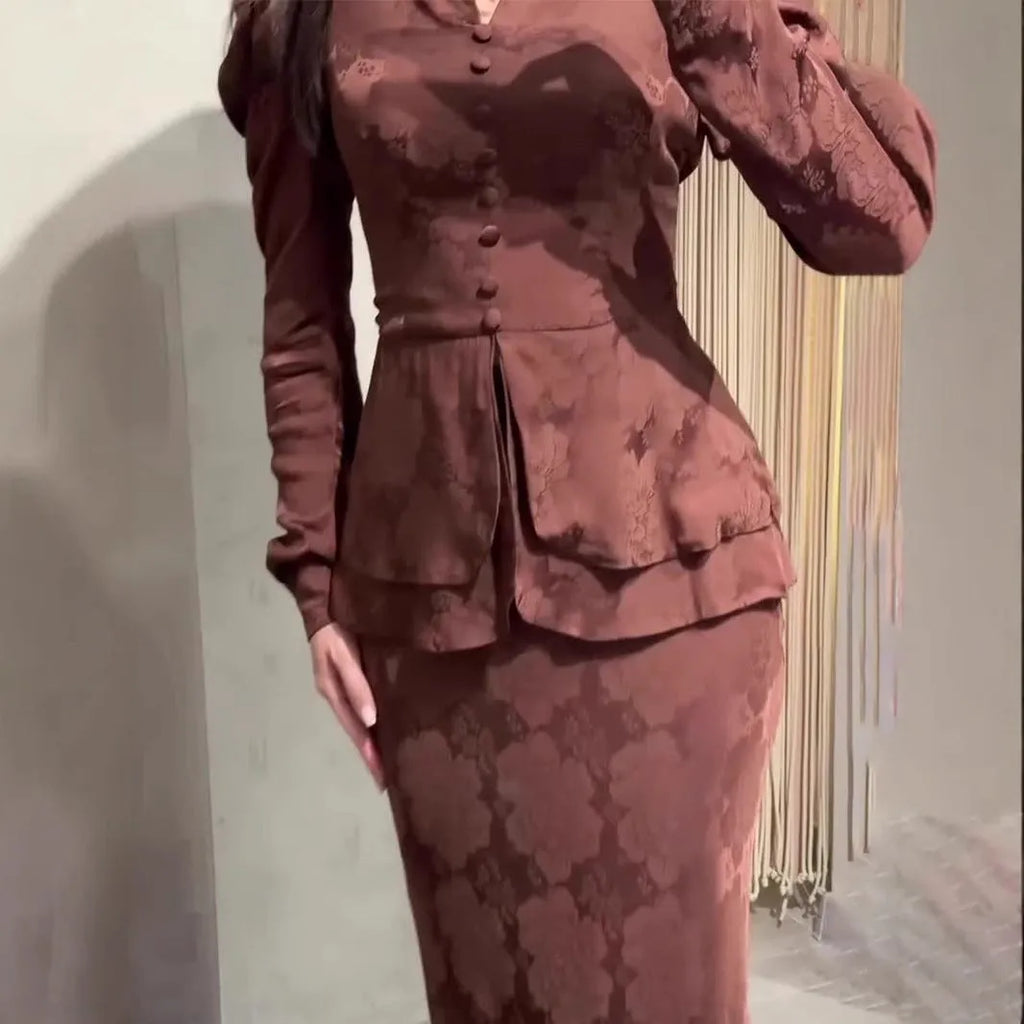 Dark brown retro dress with plants and flowers pattern, long sleeves, and fake two pieces styling