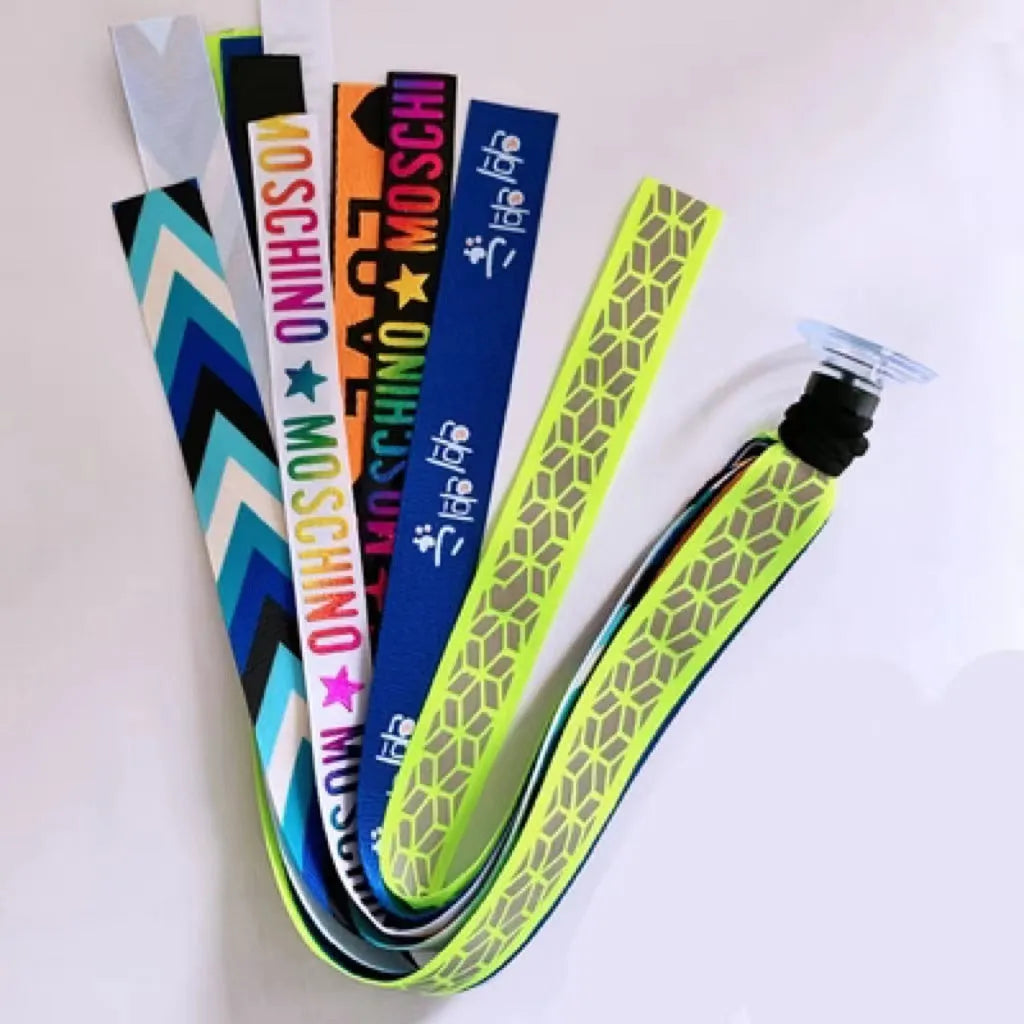 Colourful decorative ribbon streamers attached to a children safety helmet for skating or skiing