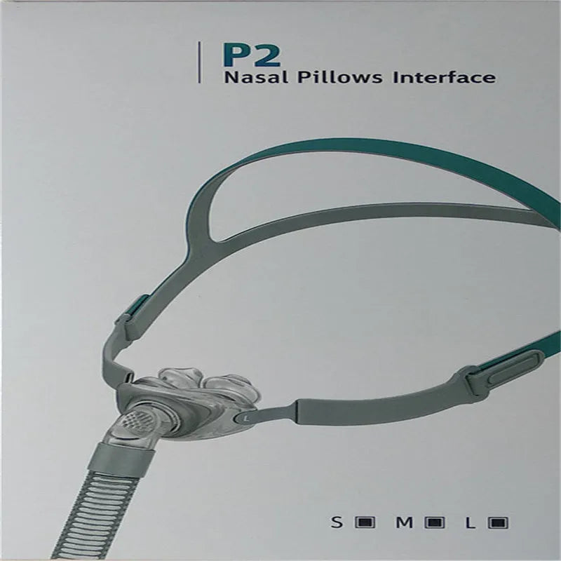 Ventilator nasal pillow mask accessory kit with silicone cushions and plastic headband.