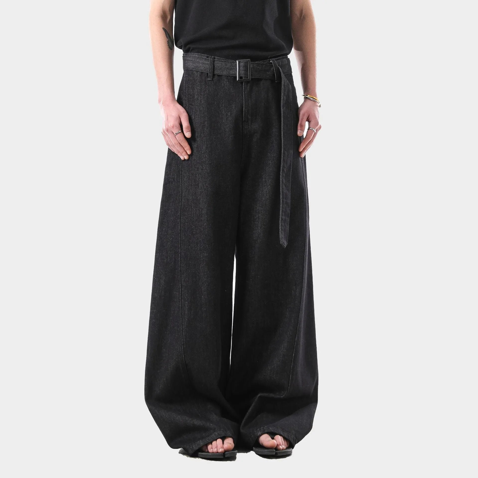 Black American retro high waist straight leg jeans with gold accents on a zip fly.