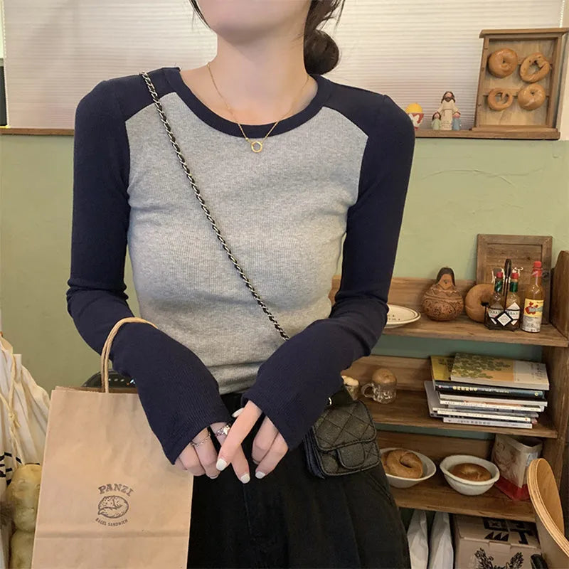 Women's dark blue viscose top with princess sleeves and embroidery detailing