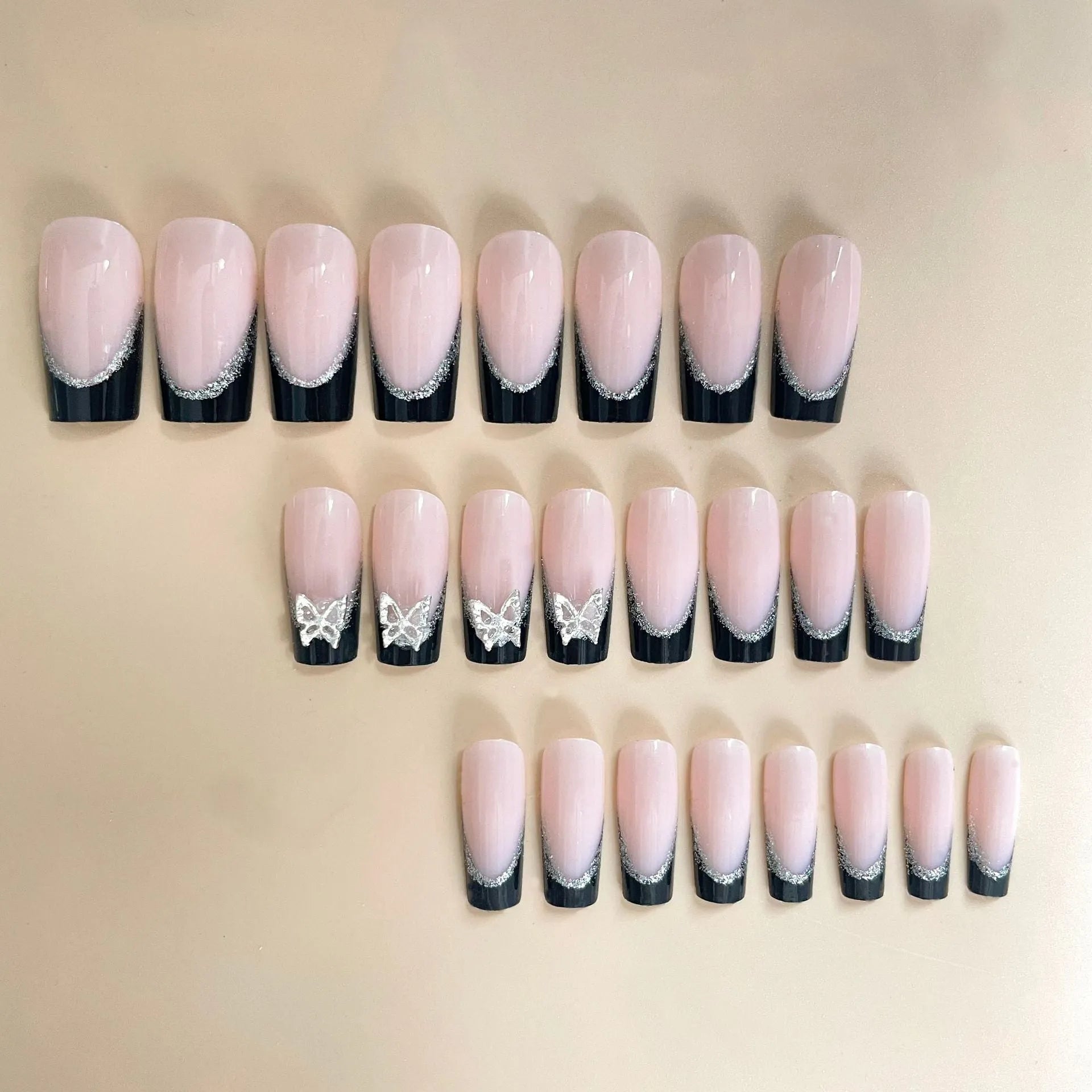 Black French style butterfly wear armour set with glittering patterns and jelly glue colour options for medium wearable nails