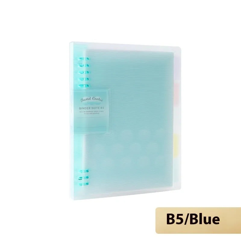 Loose-leaf spiral notebook with PP cover open, showing raw wood pulp pages in A5 or B5 size.