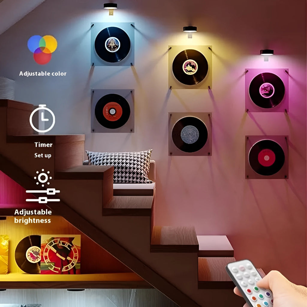 Wireless rechargeable LED painting lamp with magnetic belt attached to a metal frame, remote control nearby.
