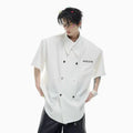 Men's loose fit casual short-sleeved summer shirt with splicing details and metal buttons
