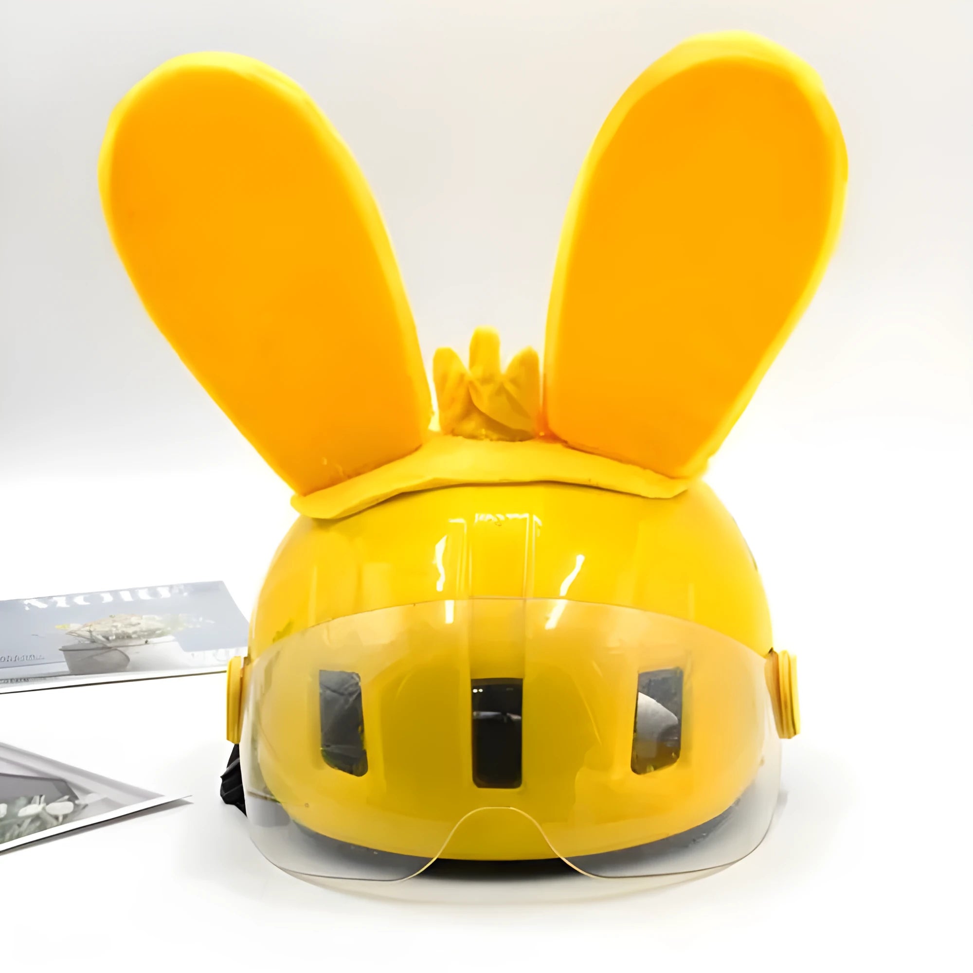 Rabbit Glow Ears helmet ornament with Velcro bottom in multiple colour options including blue, yellow, red, and purple.