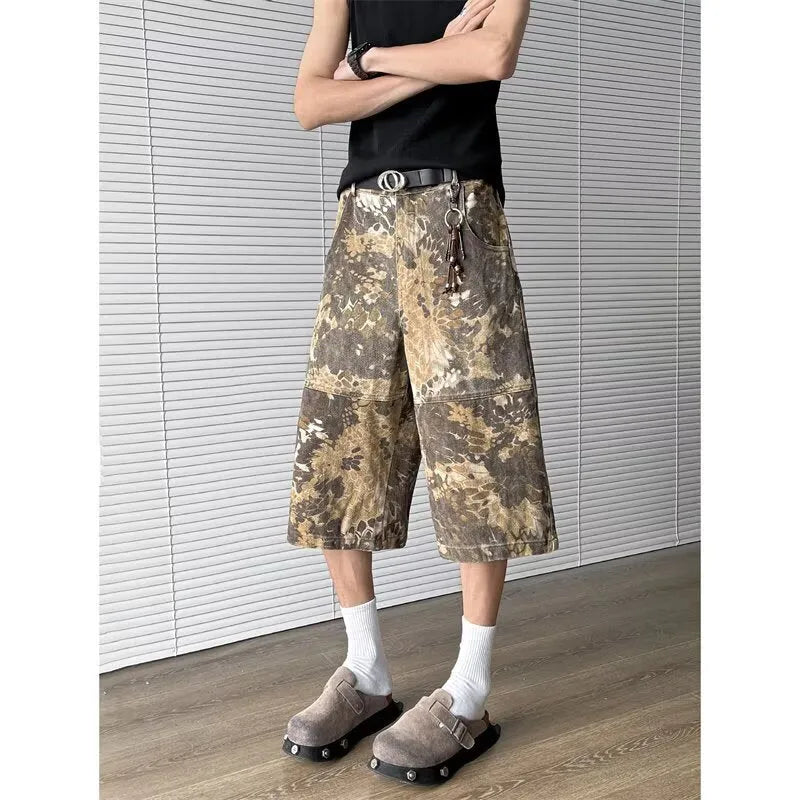 Yellow snake pattern camouflage cropped jeans on a neutral background