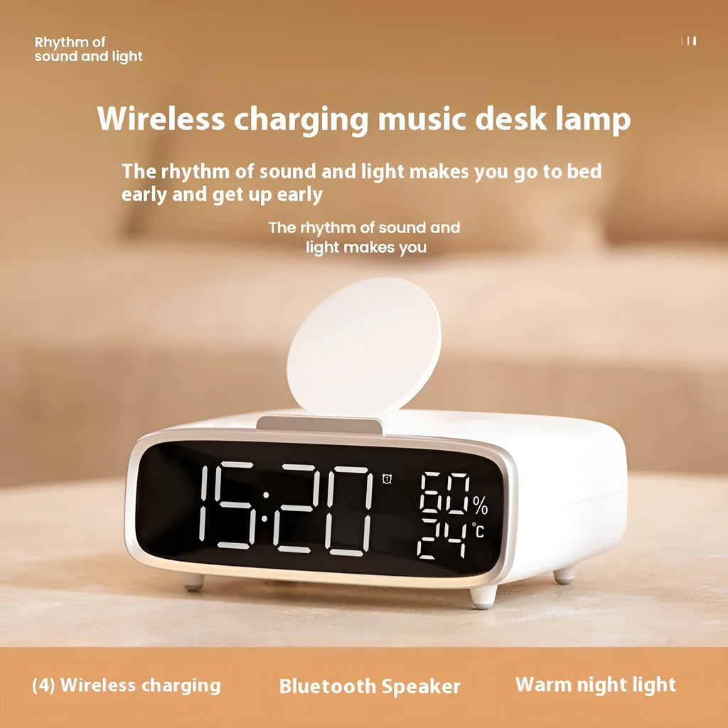 White ABS acrylic Bluetooth speaker wireless charging night lamp on a surface.