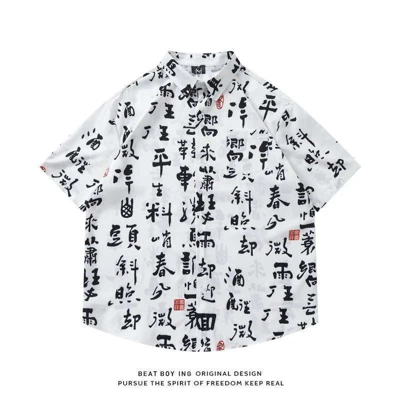 Man's loose-fit short sleeve shirt with a full floral print, styled as an open cardigan.