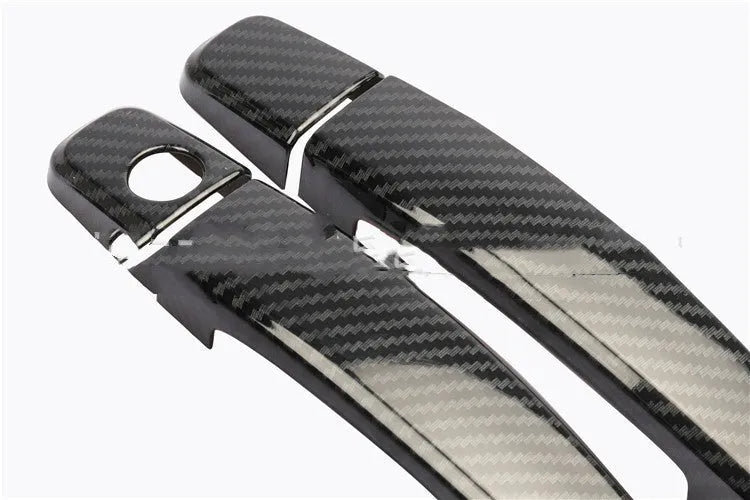 Carbon fibre pattern door handle cover for Opel Vauxhall Astra vehicles