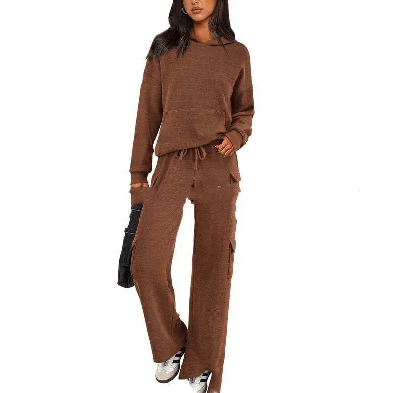 Women's long sleeve leisure sport suit top and trousers set in polyester fabric.