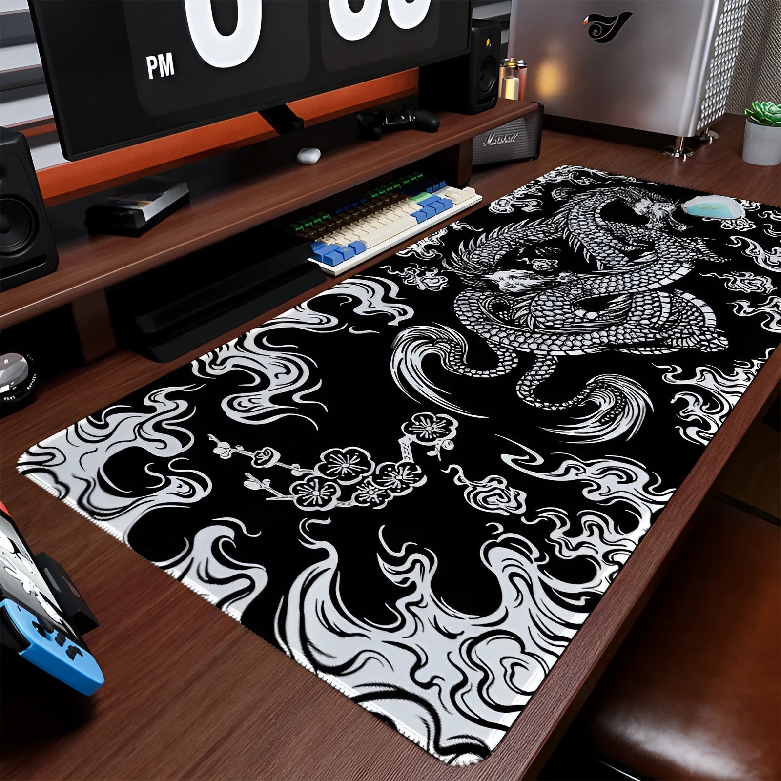 Dragon pattern cloth mouse pad with anti-slip backing showing three artwork variations on desk