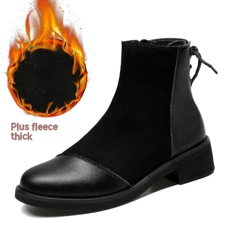 Black women's knee-high Martin boots with side zipper, round toe, and short stout heel.