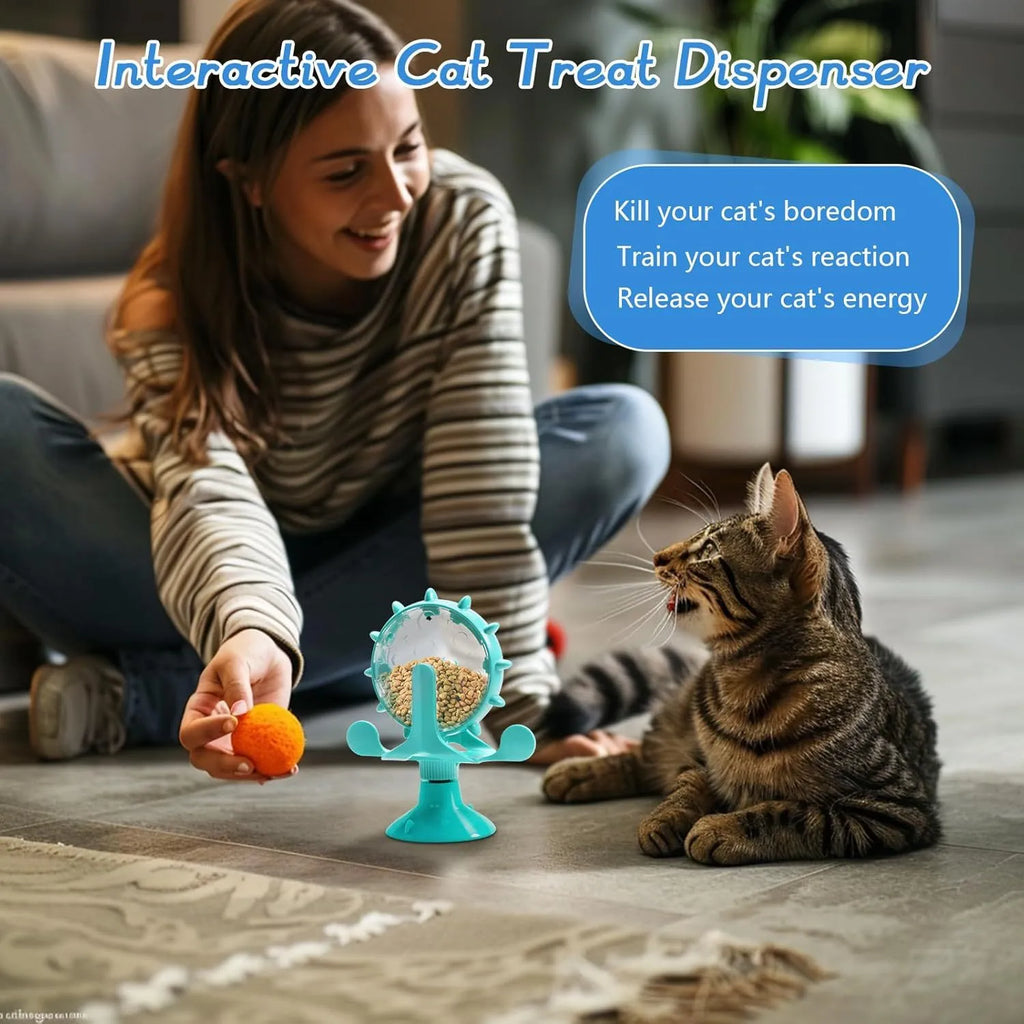 Interactive pet spinner toy in blue, green, red, or yellow with treat holes and suction base.