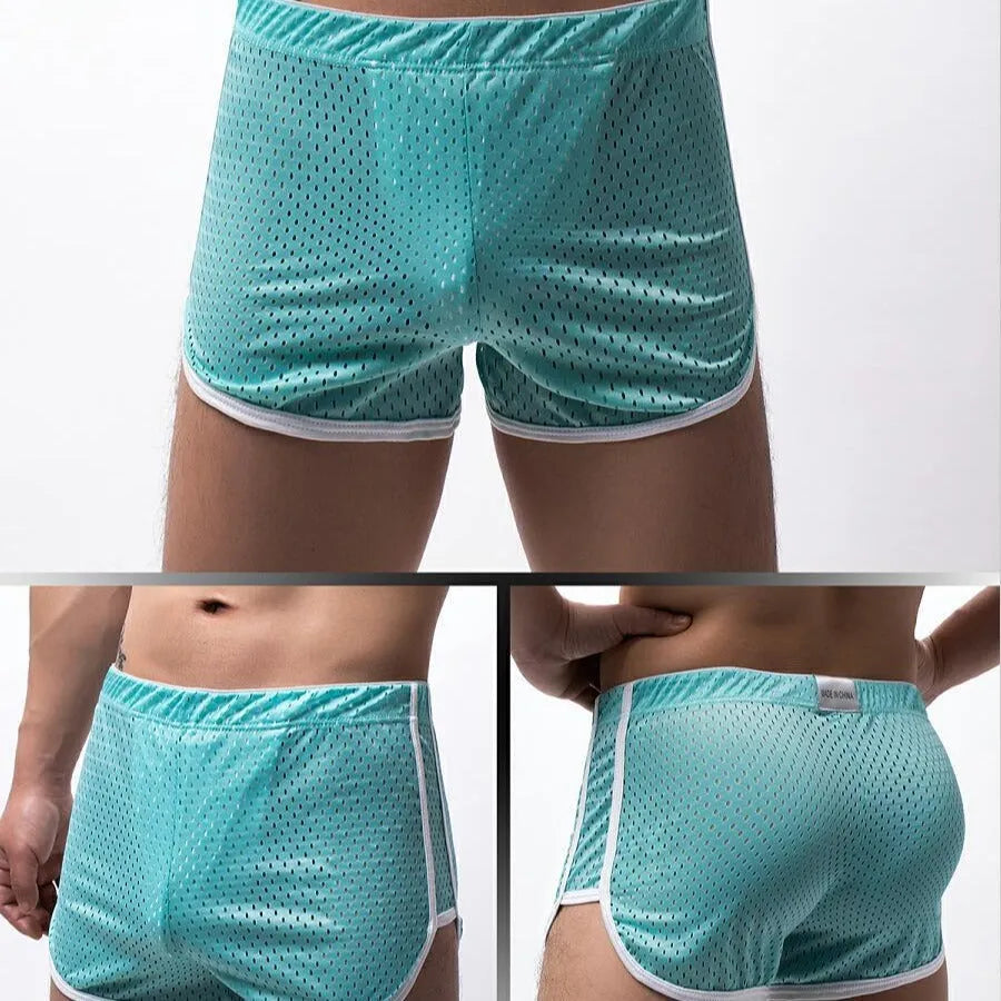 Men's cotton boxer shorts in multiple colours on a mid-waist fit model