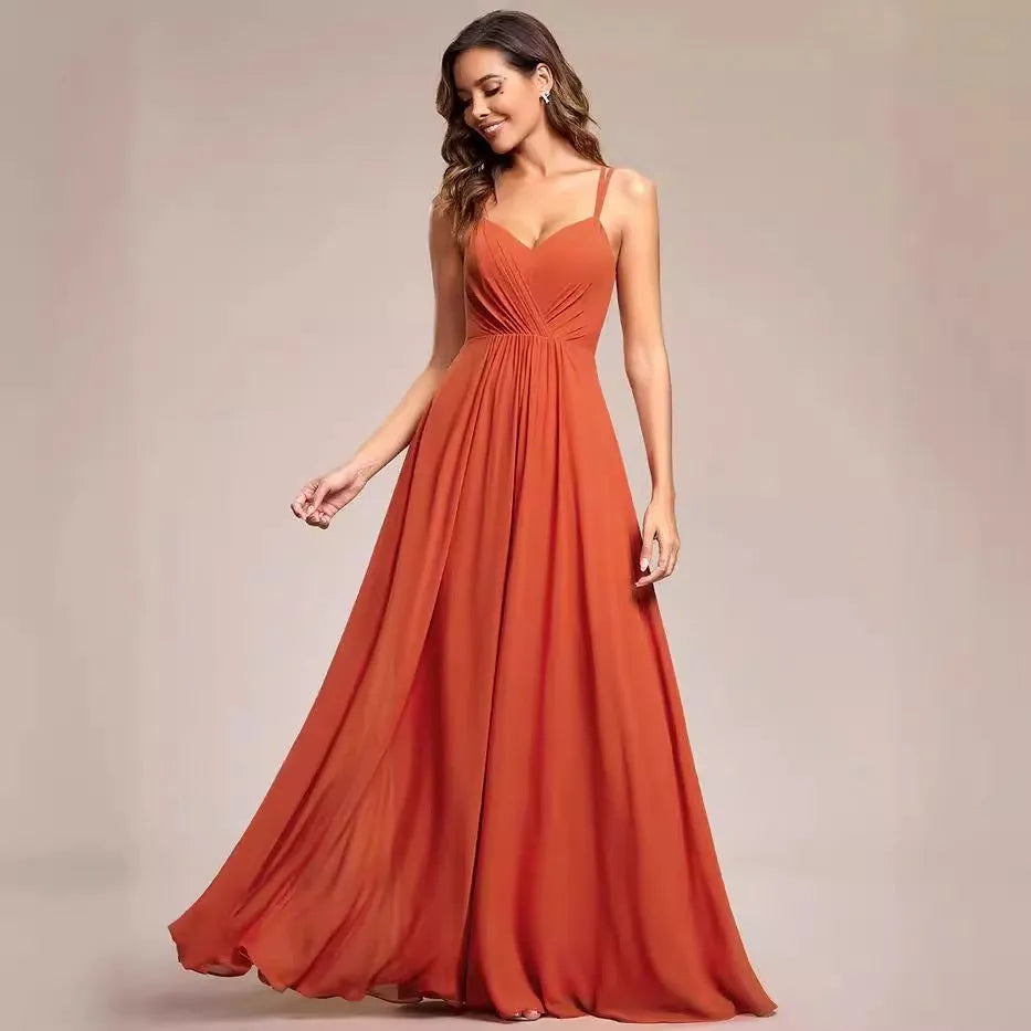 Women's sleeveless pleated A-line dress in light green with sling neckline for banquet occasions