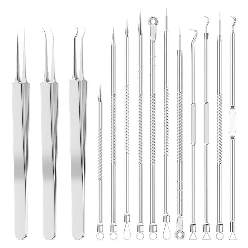 Four ultra-fine pointed metal acne needles for professional skin extraction, laid out on a surface.