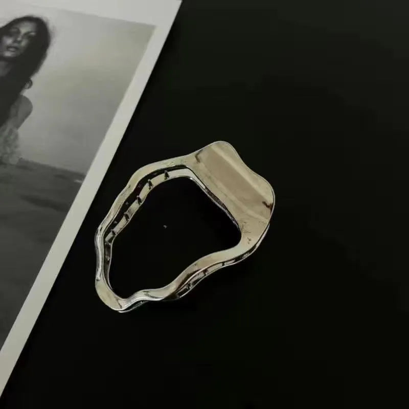 Gold and silver zinc alloy barrettes in square, arc, and triangle shapes for women