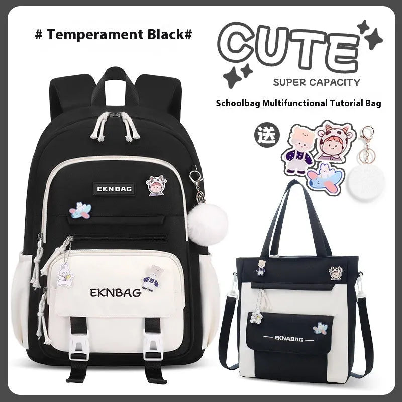 Pink waterproof Oxford cloth school backpack for girls with curved shoulder straps on a white background.