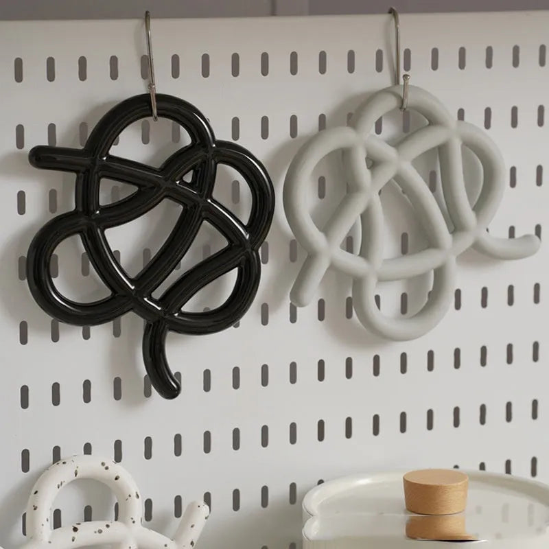 Ceramic heat proof mat with irregular shape design in solid colour options