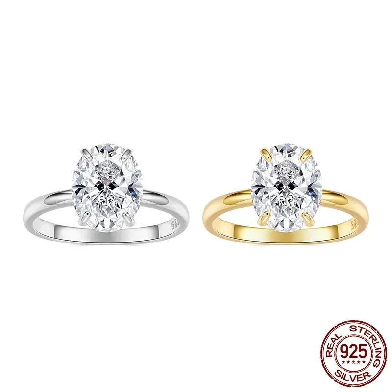 Silver oval cut zircon engagement ring with gold colour electroplating finish on white background