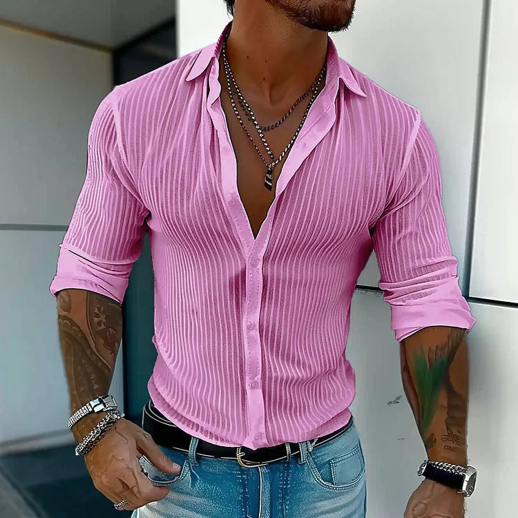Man wearing a loose fit striped cardigan shirt in British style with a 3D pattern.