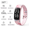 Electronic vibration alarm watch with LED display and silicone strap showing waterproof rating of 50 metres