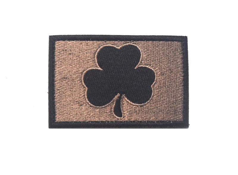 Embroidered fabric badge with hook and loop backing in various colour designs for industrial textile use