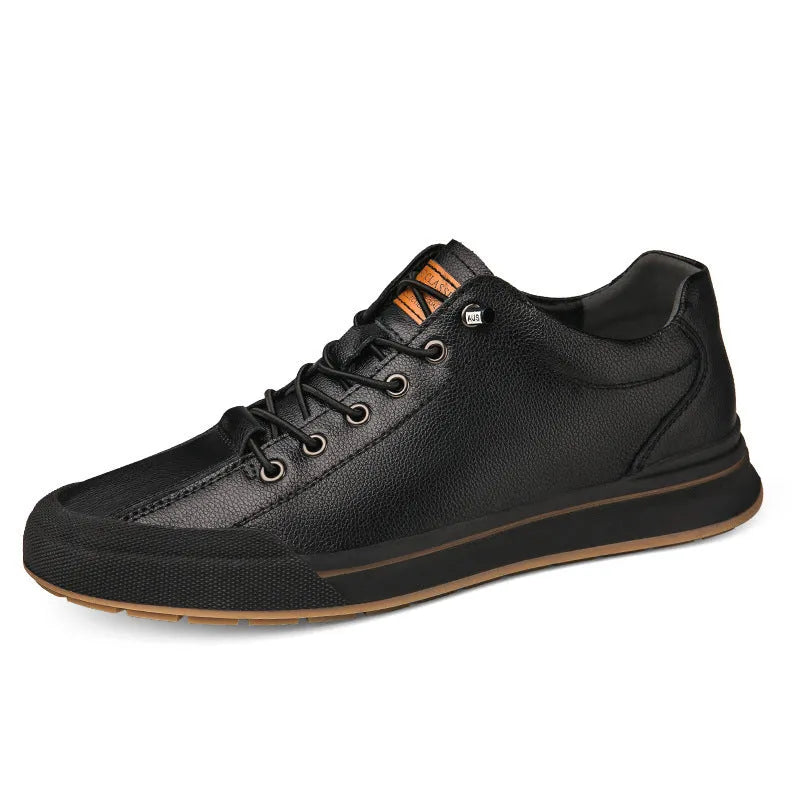 Men's white leather casual shoes with flat heel and round toe on a plain background