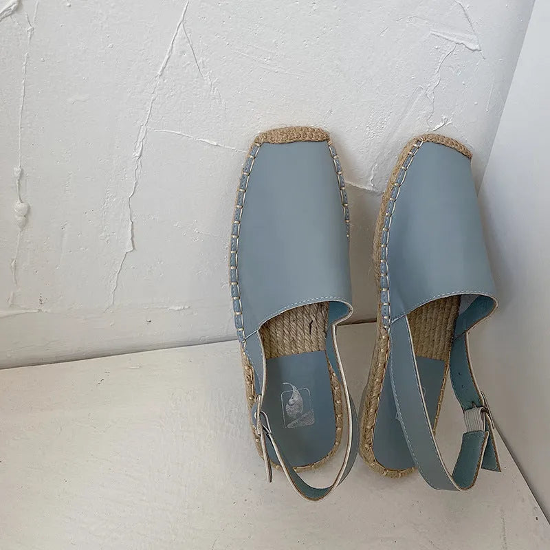 Women's beige canvas flat sandals with a retro fisherman design and superfine fibre lining.