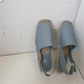 Women's beige canvas flat sandals with a retro fisherman design and superfine fibre lining.