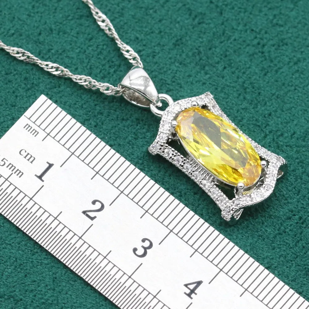 Olive and yellow anti-allergy alloy zircon jewellery set showing necklace, earrings, ring, and bracelet on a display.