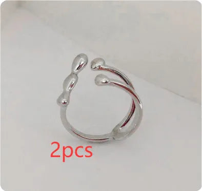 Gold or silver plated brass opening ring with circular sphere design for women