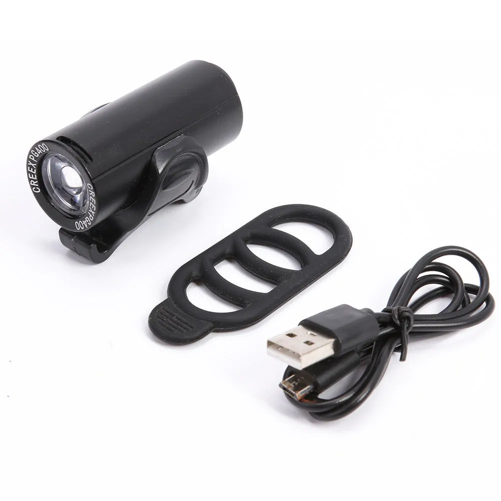 Black USB rechargeable 350 lumen bicycle front light on handlebars