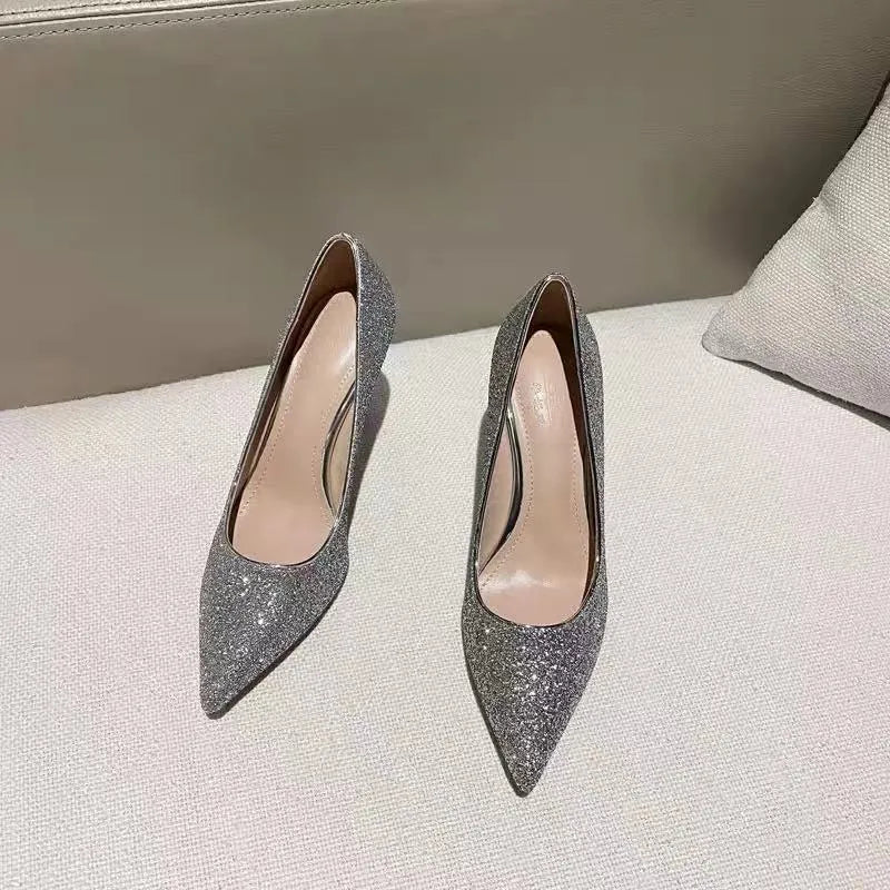 Women's silver and black wedding shoes with crystal detail and multiple heel height options