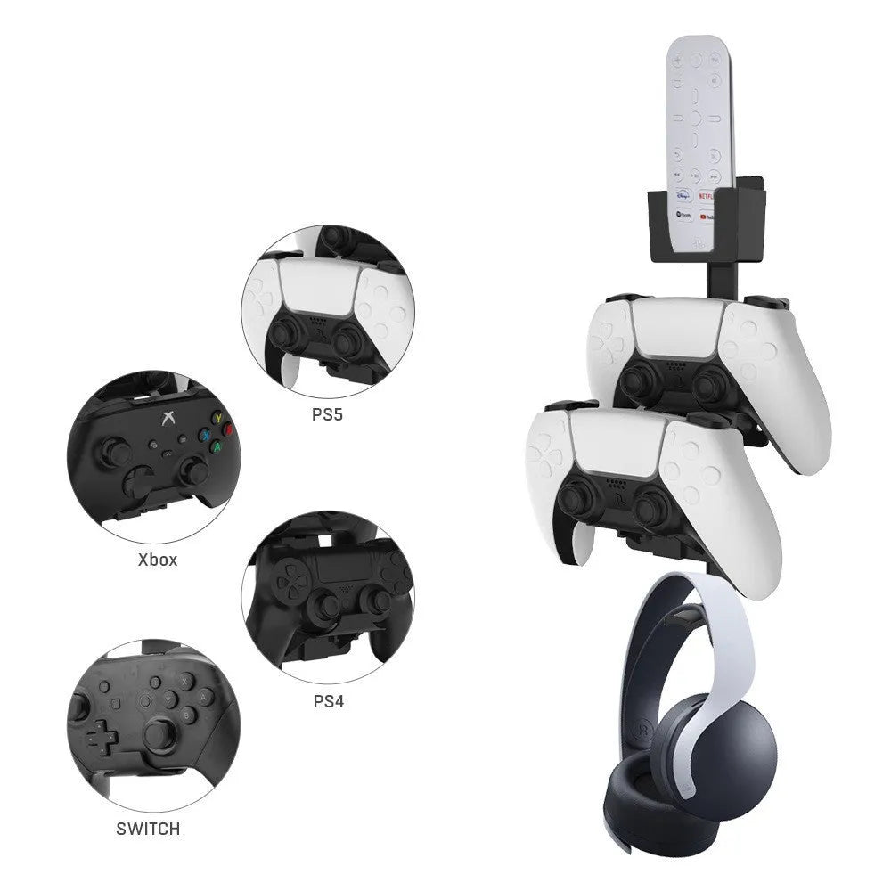 White wall-mounted plastic hook holding a PS5 controller and a gaming headset.