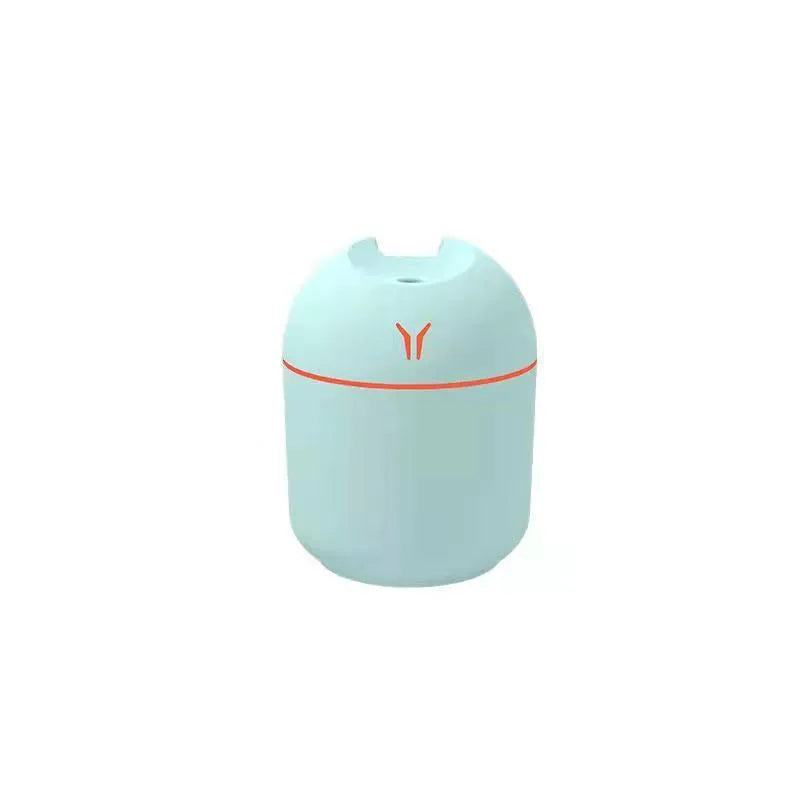 Round desktop humidifier with USB cable in ivory white, sky blue, and girlish pink colour options