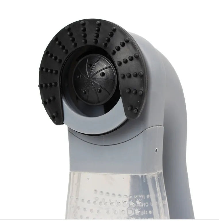 Grey cordless handheld pet hair vacuum grooming brush with soft rubber head