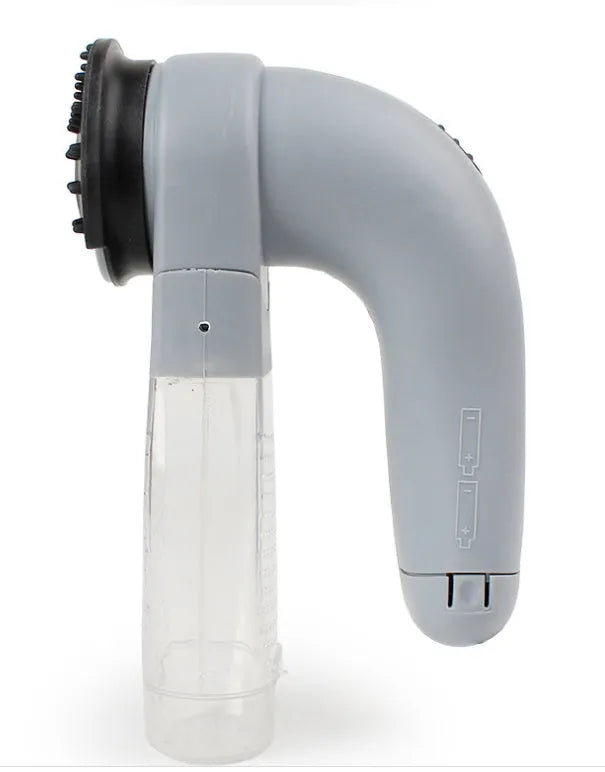 Grey cordless handheld pet hair vacuum grooming brush with soft rubber head