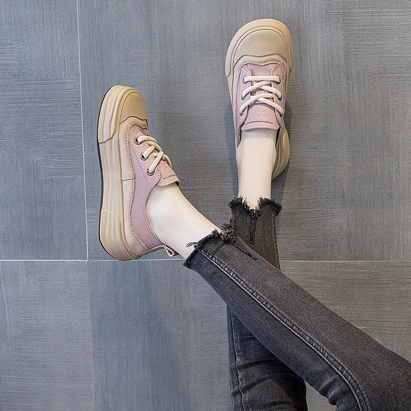 Women's leather platform sneakers in matcha green, showing lace-up front and round toe design.