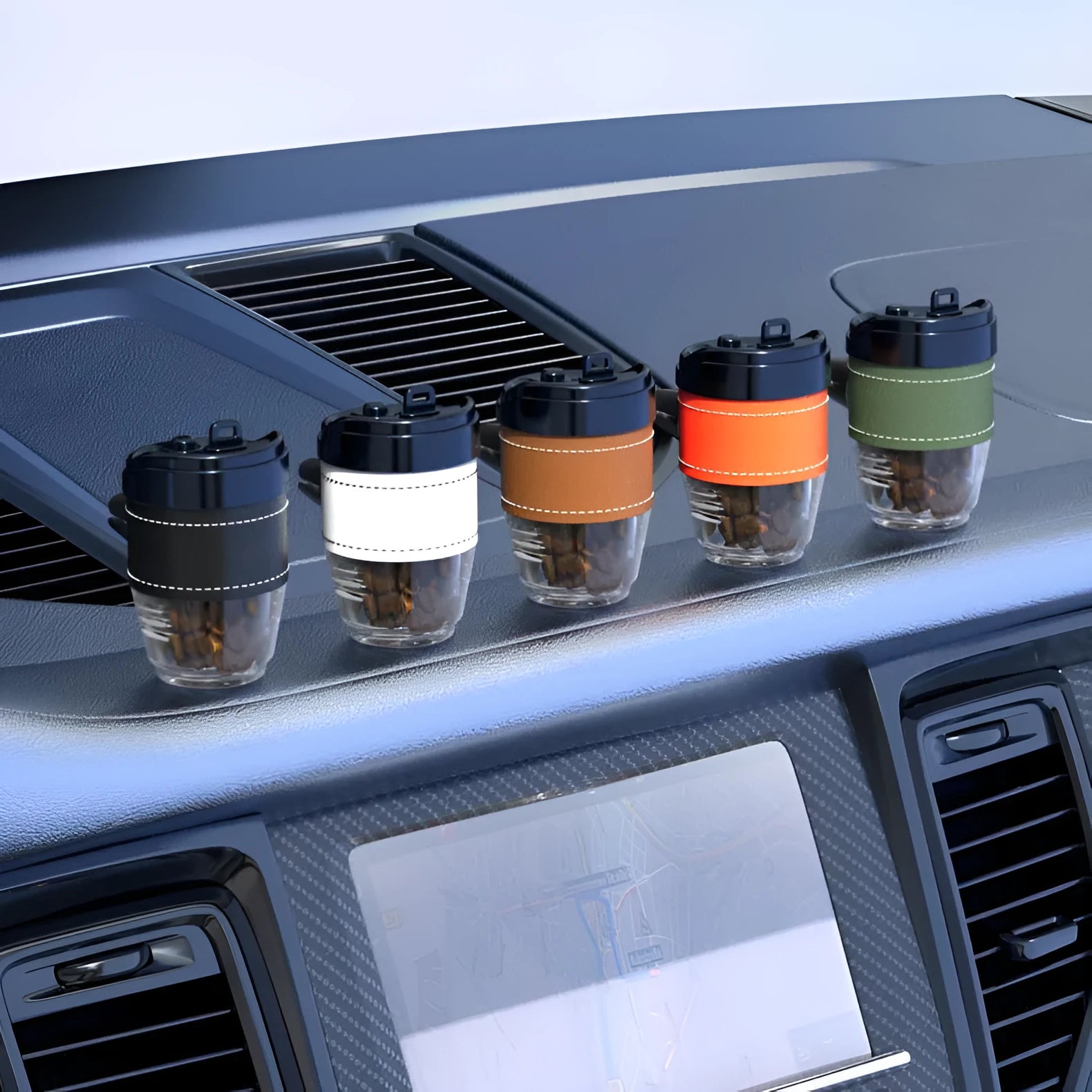 Solid coffee bean car air freshener shaped like a coffee cup on a car dashboard.