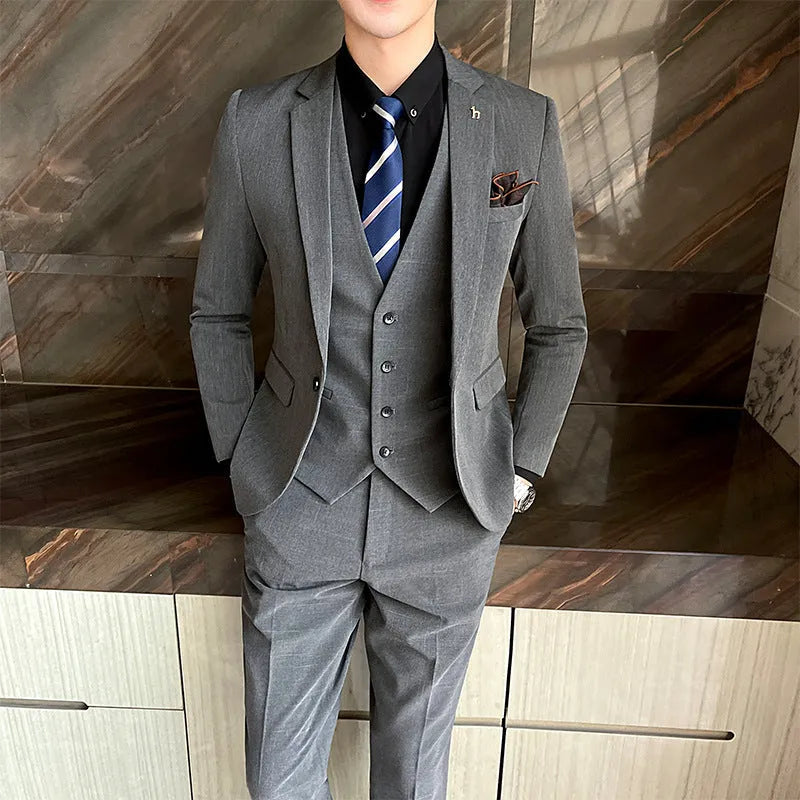 British style slim fit men's business suit in black or dark grey with adhesive interlining construction