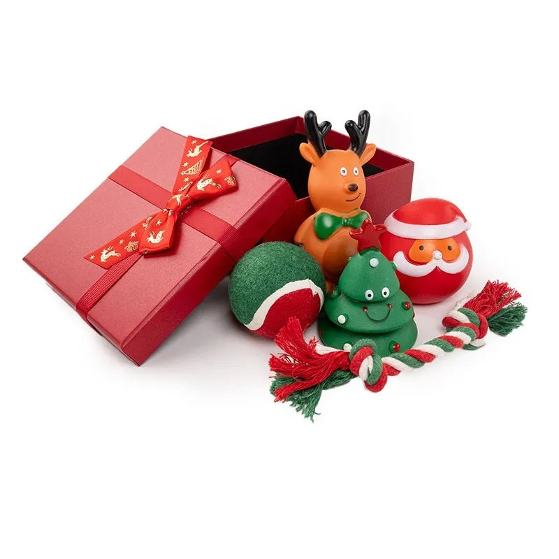 Christmas vinyl dog toy set with Santa Claus heads, trees, tennis balls, and bite ropes