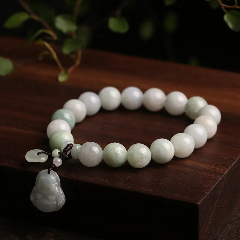 Natural green jade bracelet with geometric links and a carved Maitreya Buddha pendant.