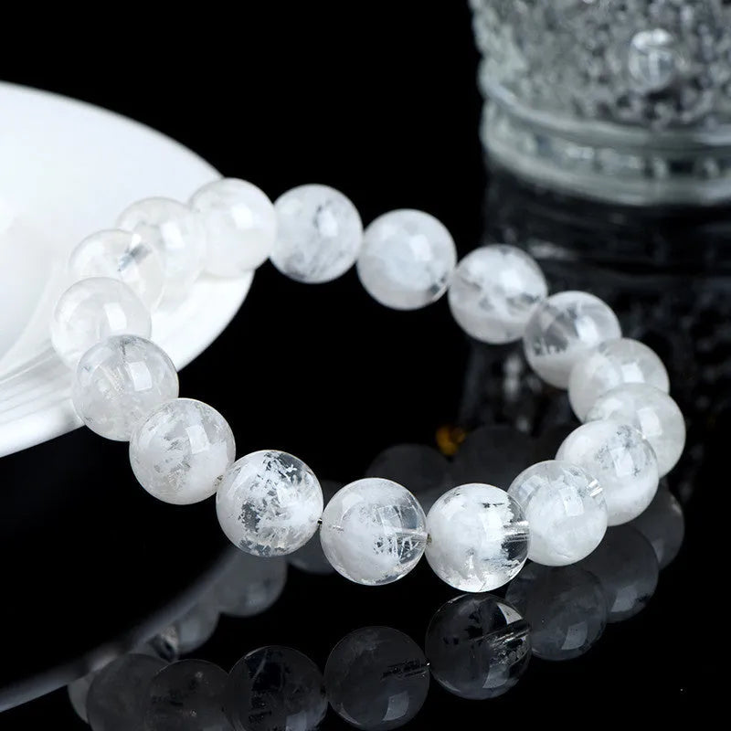 Women's natural blizzard crystal bracelet with geometric beads featuring Ruyi and Xiangyun design.